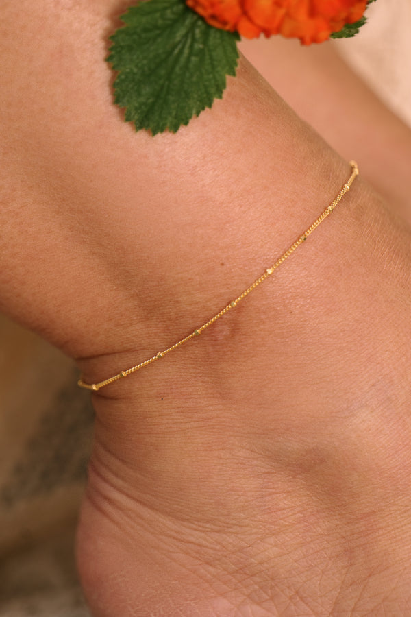 Satellite Anklet worn in gold